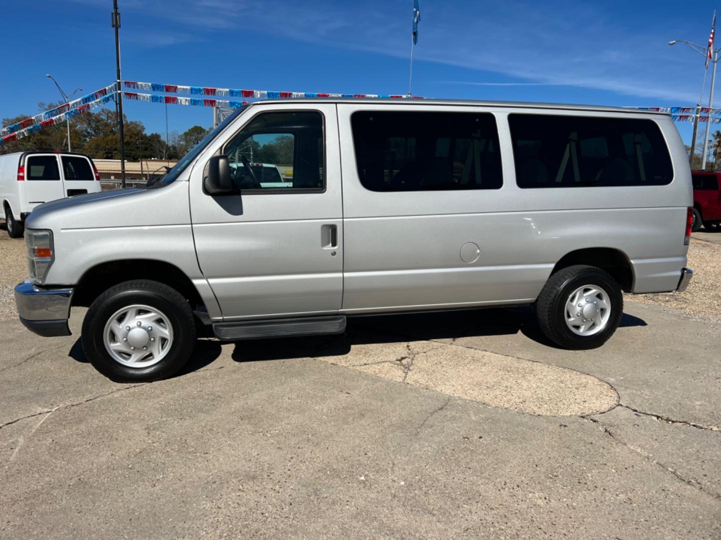 2012 Silver /Gray Ford E-Series Wagon XLT (1FBNE3BL0CD) with an 5.4 V8 engine, Automatic transmission, located at 4520 Airline Hwy, Baton Rouge, LA, 70805, (225) 357-1497, 30.509325, -91.145432 - 2012 Ford E350 XLT 12 Passenger Van 5.4 V8 Gas, 175K Miles, Power Windows & Locks, Interior & Exterior In Good Shape, Radio Needs To Be Changed, Tow Pkg. NO IN HOUSE FINANCING. FOR INFO PLEASE CONTACT JEFF AT 225 357-1497 CHECK OUT OUR A+ RATING WITH THE BETTER BUSINESS BUREAU WE HAVE BEEN A FAMI - Photo#1